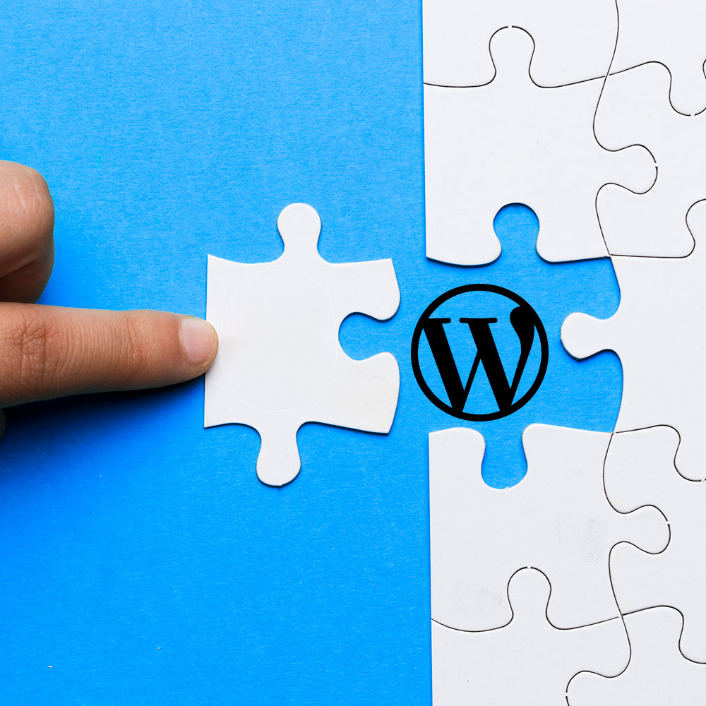 Imagen de un puzle con el logo de WordPress