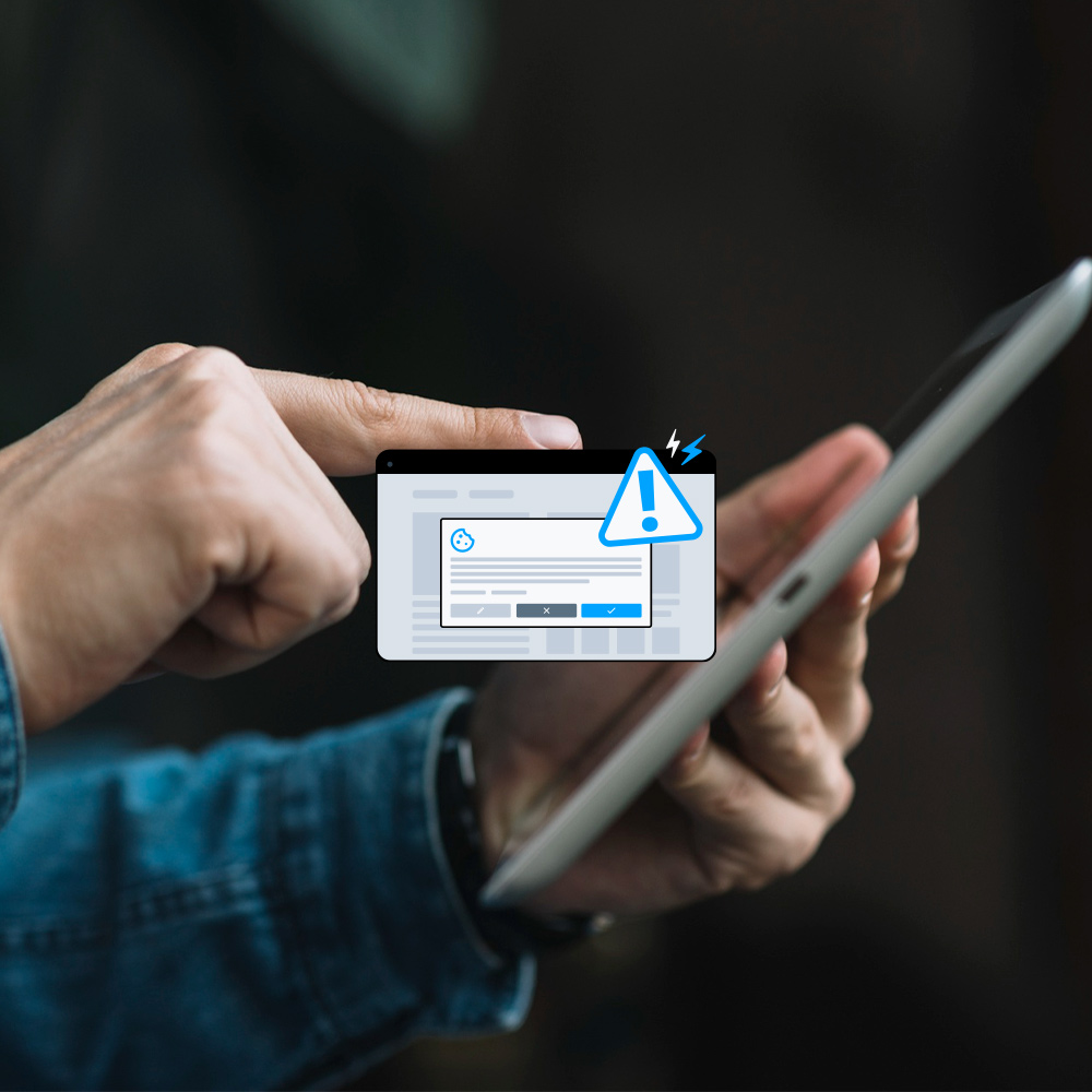 Image of a hand operating a smartphone and an illustration of a cookie wall on top