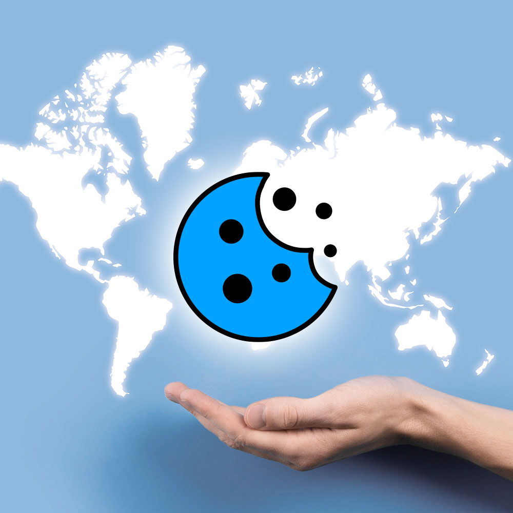 Illustration of a world map and a hand holding a cookie