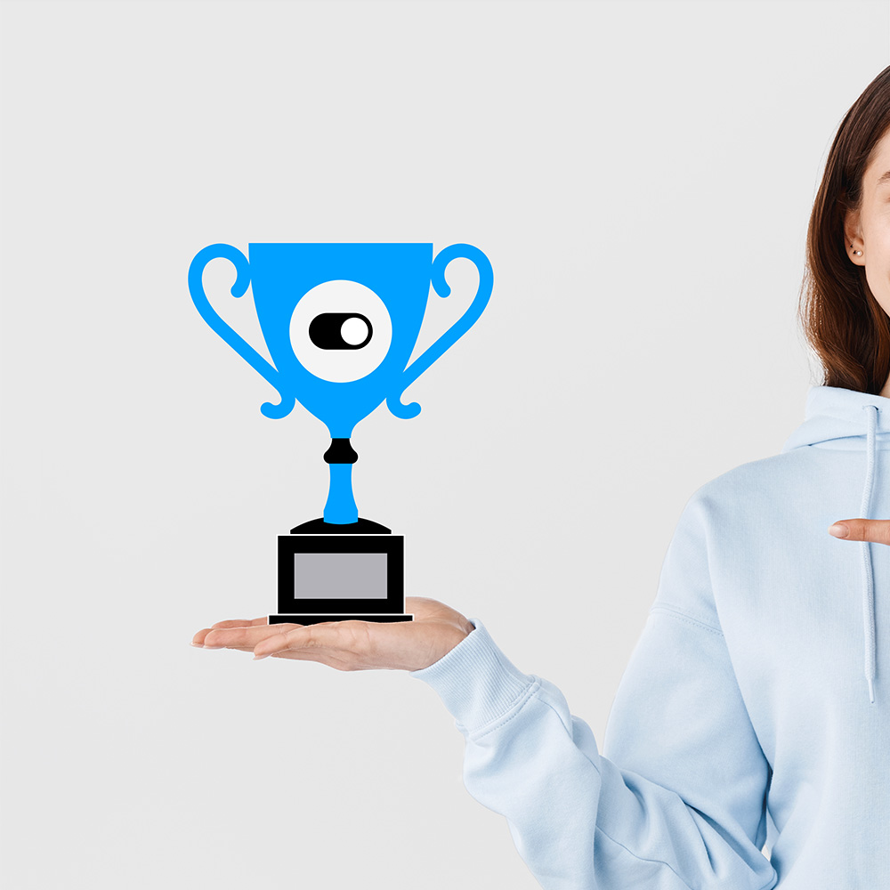 Woman holding trophy with toggle icon