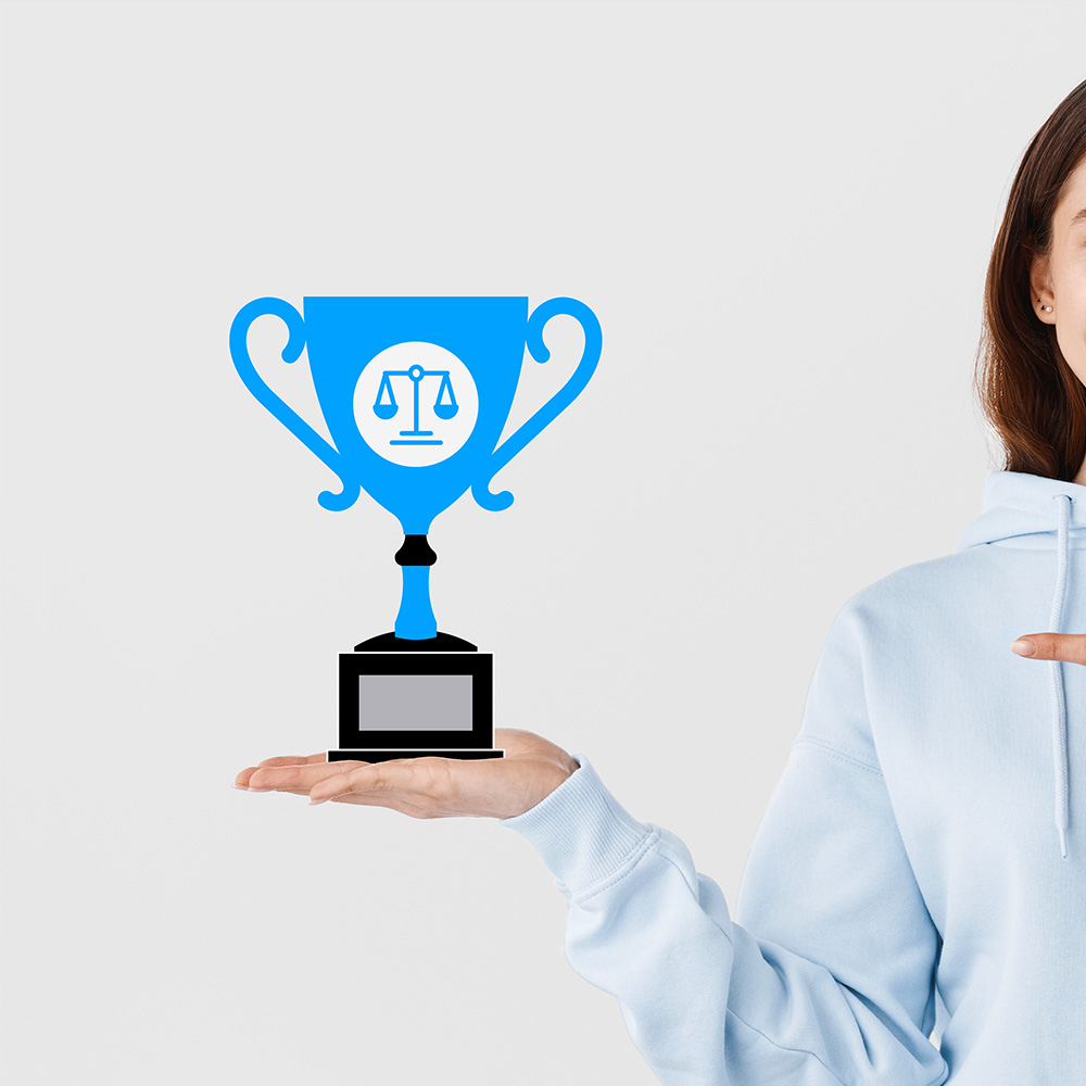 Woman holding trophy with law icon